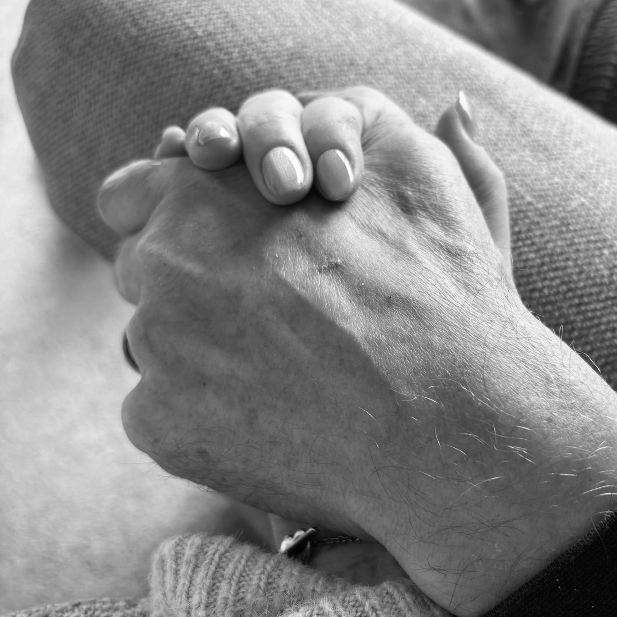 Micro Provider holding a client's hand.